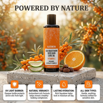 Sea buckthorn seed skin care oil bottle with natural ingredients on a wooden surface, surrounded by sea buckthorn berries and an orange.