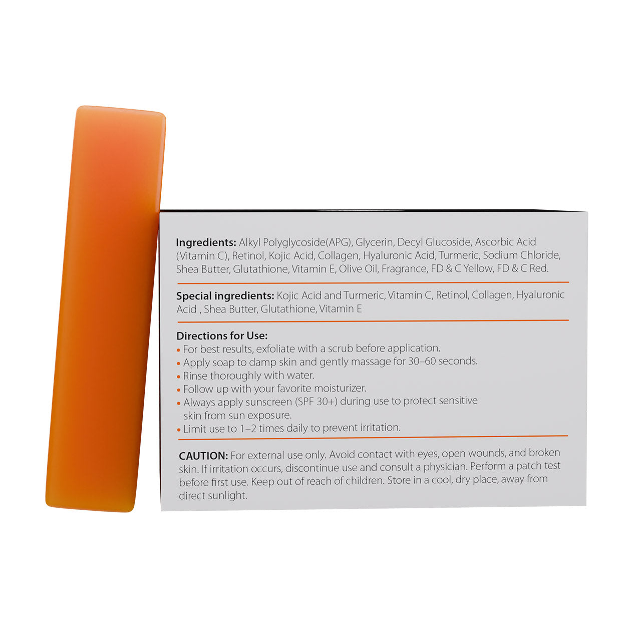 Orange bar of soap with a label displaying ingredients and directions on a white background