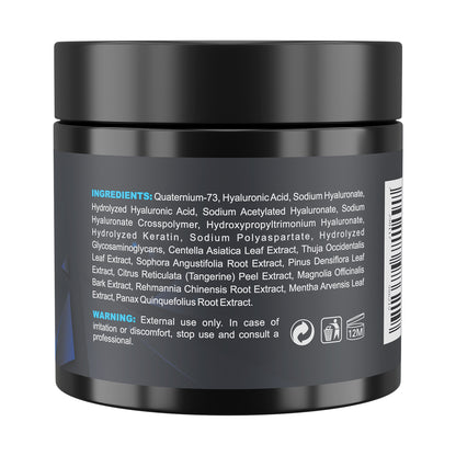 Back view of a black jar with ingredient list and warning text on a white background